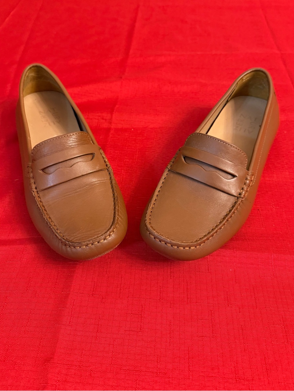 Coach women’s Leather Penny Loafers in Chestnut Brown